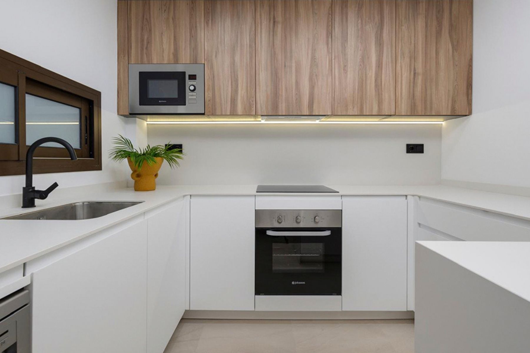 Imagen de la cocina de los bloques finalizados en el residencial que estamos trabajando en Los Alcázares